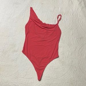 Urban Outfitters coral scowl neck line body suit